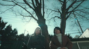 The Woman in the White Car - Film Screenshot 8